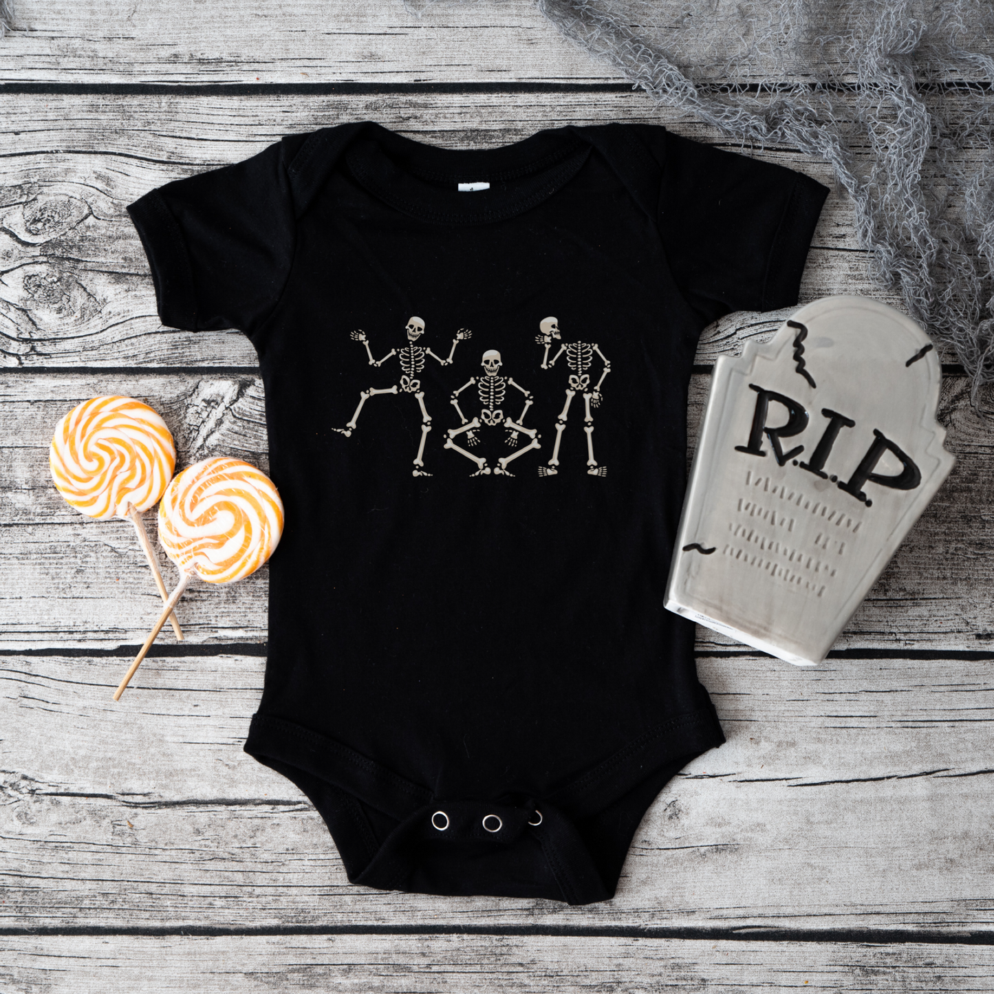 DANCING SKELETONS BABY BODYSUIT IN BLACK - BAT BABIES